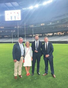 Hooke Family Standing on the MCG feild as the are pictured recieving the Farmer of the year award. 