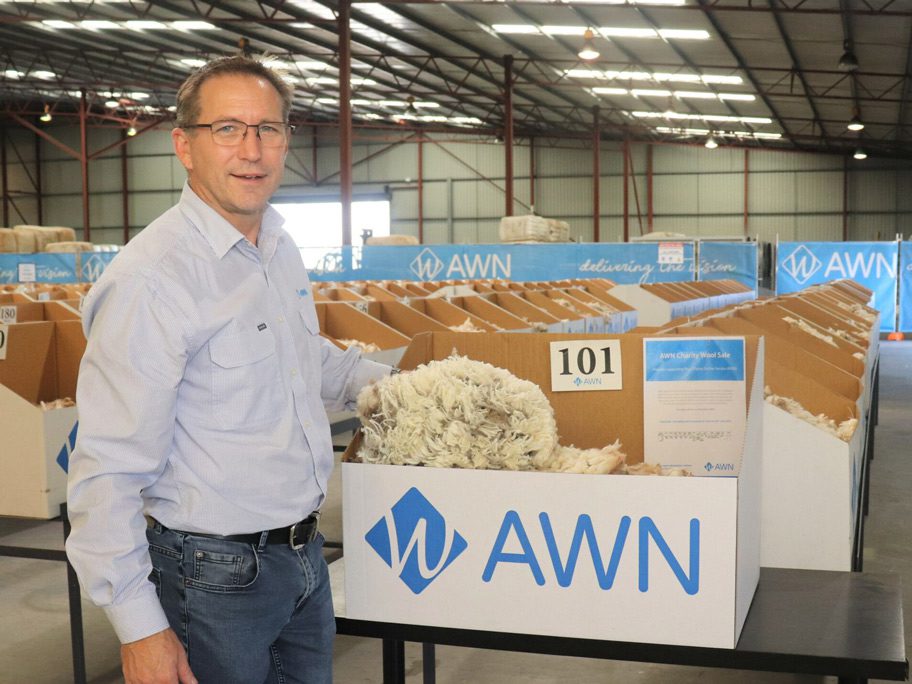 Following the AWN Charity Auction for the Royal Flying Doctor Service in Fremantle, WA. AWN Western Australia Wool Manager, Greg Tilbrook, is standing next to the charity wool in the Fremantle showfloor.
